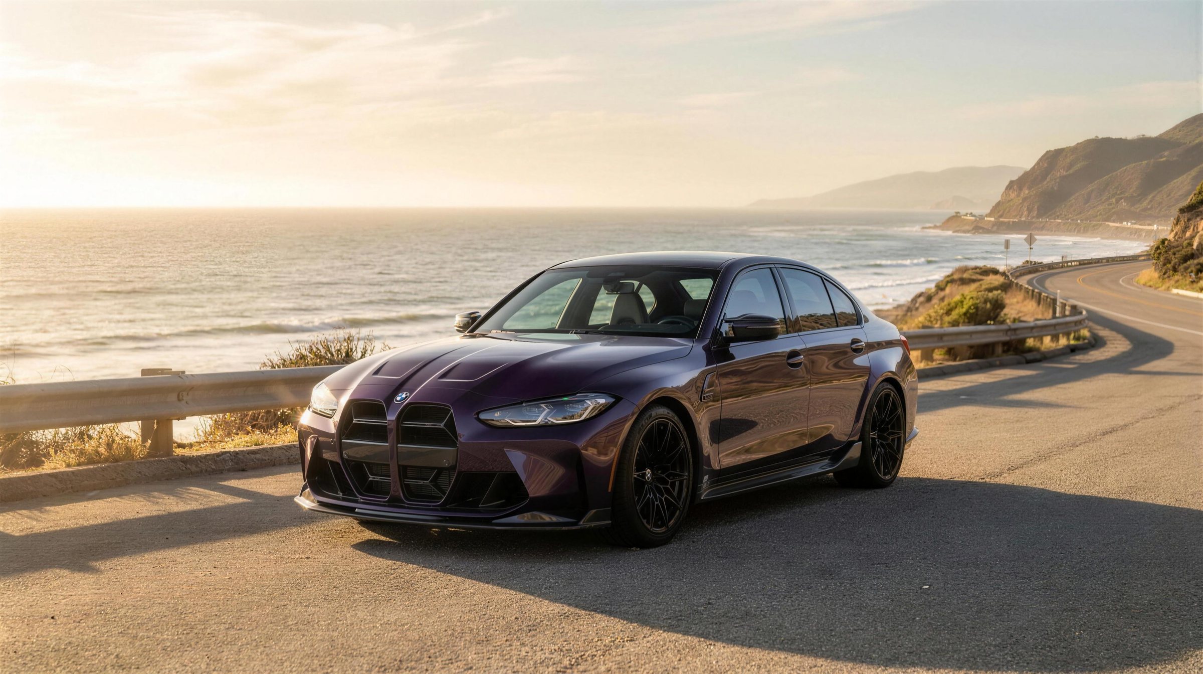 BMW G80 M3 in Twilight Purple with ADEX dry carbon front lip, vented hood, side skirts and rear extensions, on the Pacific Coast Highway