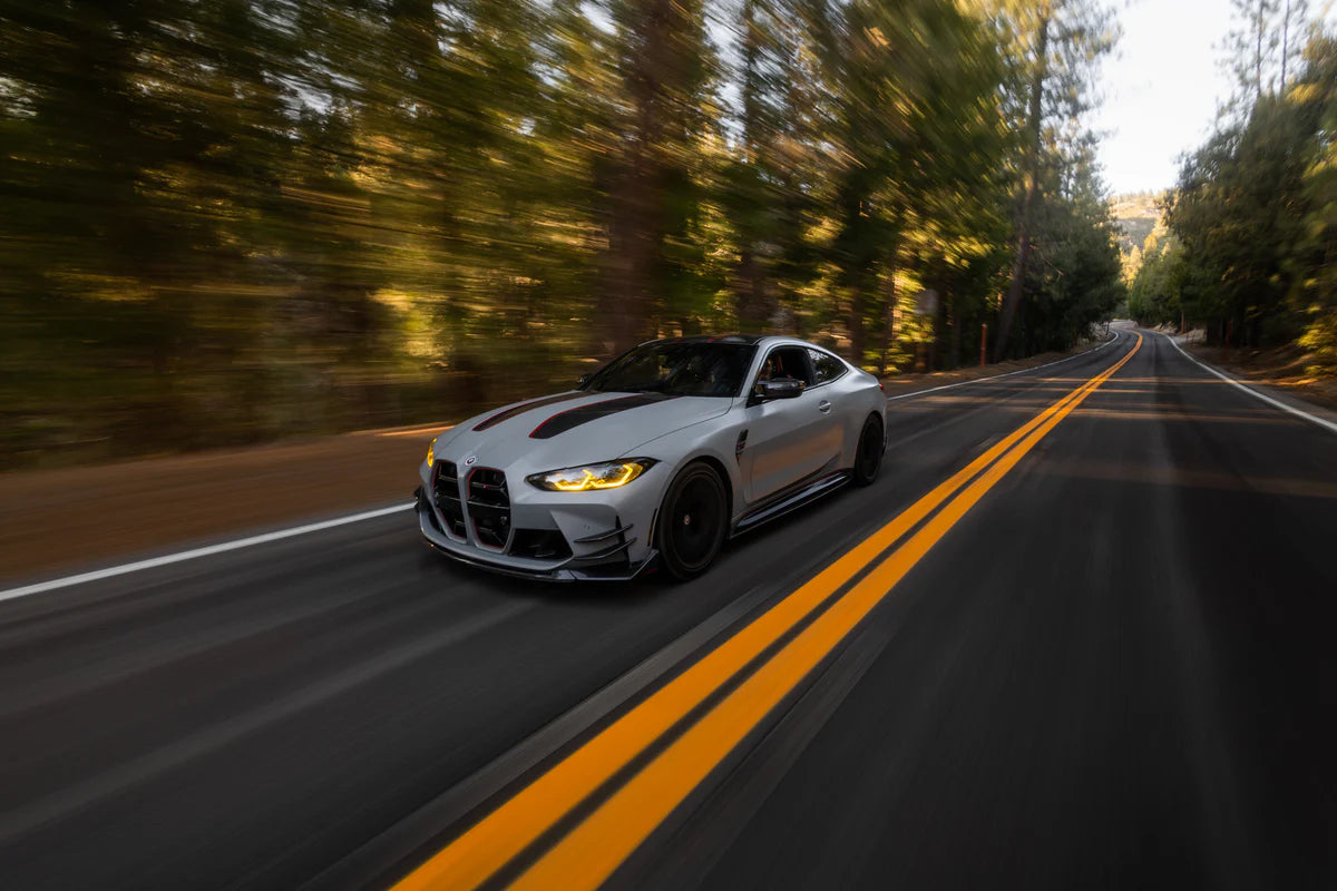 BMW M4 with ADEX carbon fiber aero at speed